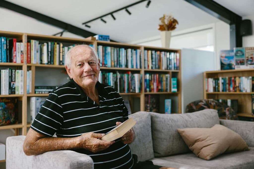 Leigh Holm enjoying the library at The Botanic